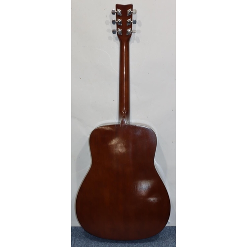 631 - A Yamaha F310 6-string guitar, 103cm high overall