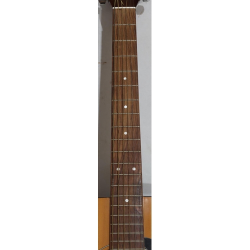 631 - A Yamaha F310 6-string guitar, 103cm high overall