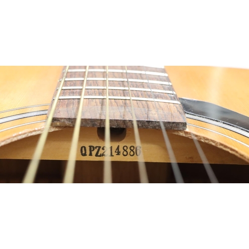 631 - A Yamaha F310 6-string guitar, 103cm high overall