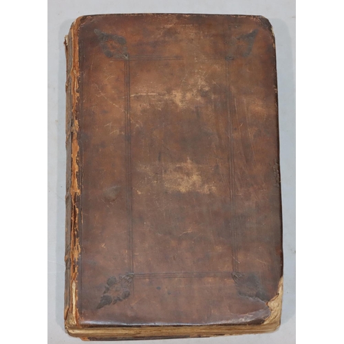 677 - A 17th Century leather bound book 