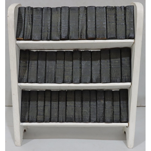 684 - A set of 39 miniature William Shakespeare books in white painted 3-tier book trough, 3cm high, 19.5c... 