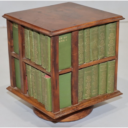 685 - A set of 40 miniature William Shakespeare green bound books in miniature revolving square bookcase, ... 