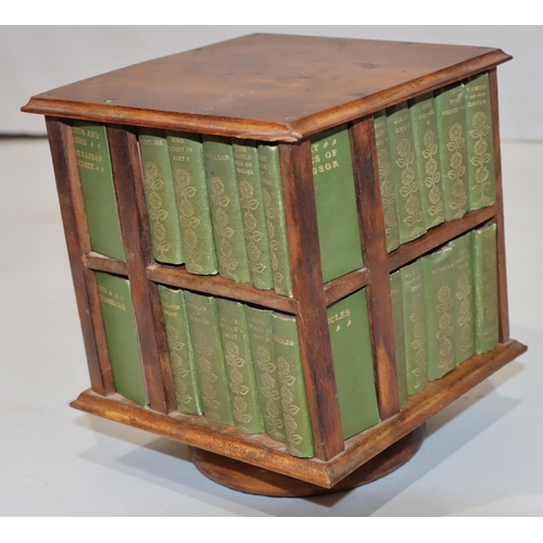 685 - A set of 40 miniature William Shakespeare green bound books in miniature revolving square bookcase, ... 