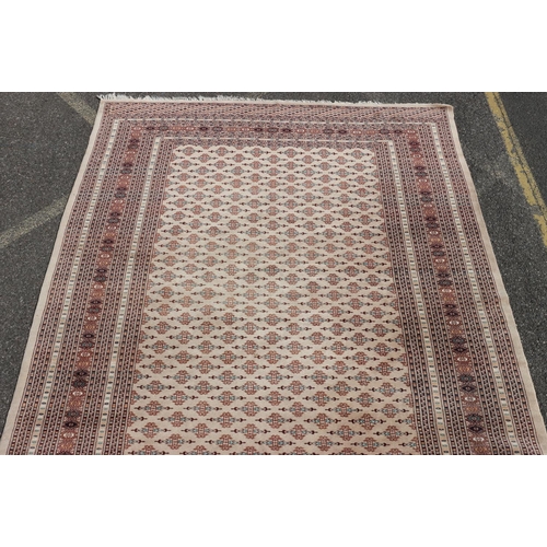 687 - A modern Persian carpet on cream ground with allover medallions, 288cm x 230cm