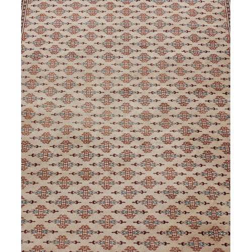 687 - A modern Persian carpet on cream ground with allover medallions, 288cm x 230cm