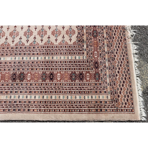 687 - A modern Persian carpet on cream ground with allover medallions, 288cm x 230cm