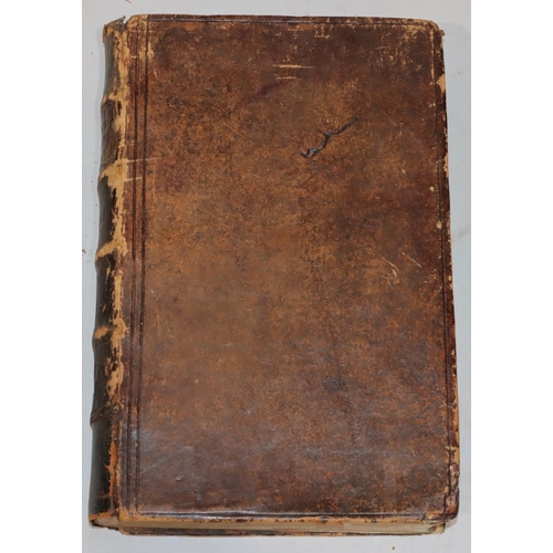 697 - An 18th Century leather bound book, 