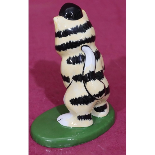 7 - A Lorna Bailey Art Deco style china figure of a cat playing golf, 14cm high