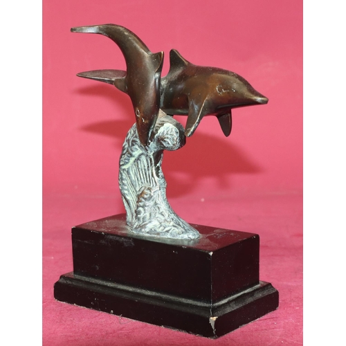 706 - A reproduction bronze group of 2 dolphins on black rectangular base, 19.5cm high