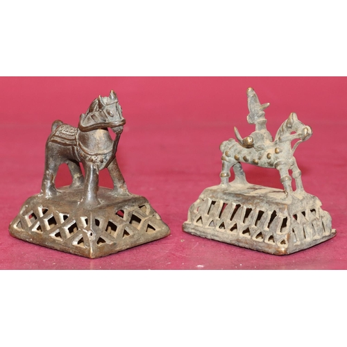 717 - 2 Eastern bronze rattles in the form of figures and horses on rectangular shaped bases, largest 9.5c... 