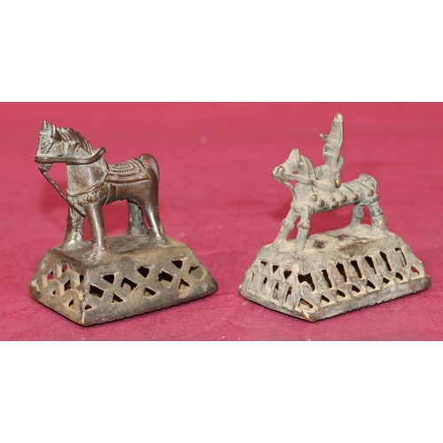 717 - 2 Eastern bronze rattles in the form of figures and horses on rectangular shaped bases, largest 9.5c... 