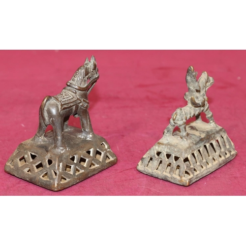 717 - 2 Eastern bronze rattles in the form of figures and horses on rectangular shaped bases, largest 9.5c... 