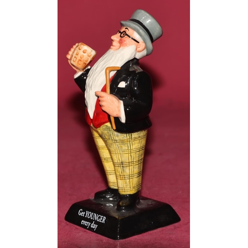 72 - A limited edition Royal Doulton bone china advertising figure 