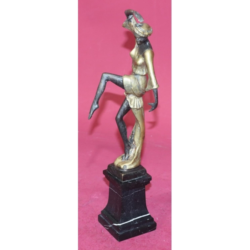 723 - A reproduction Art Deco style gilt bronze figure of a female dancer on square black onyx plinth, 38.... 