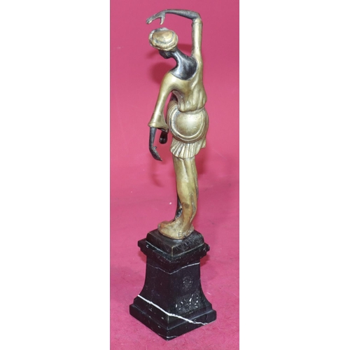 723 - A reproduction Art Deco style gilt bronze figure of a female dancer on square black onyx plinth, 38.... 