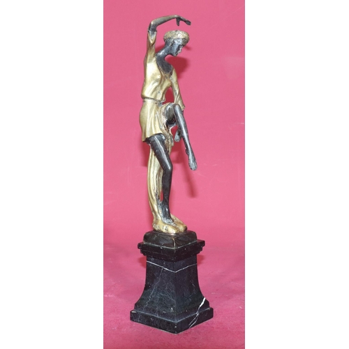 723 - A reproduction Art Deco style gilt bronze figure of a female dancer on square black onyx plinth, 38.... 