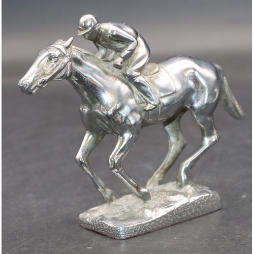 733 - A chrome car mascot in the form of a jockey on horseback, 11cm high, 13.5cm long