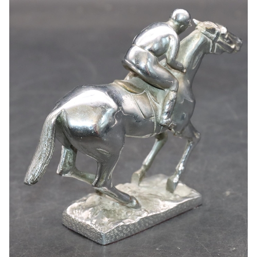 733 - A chrome car mascot in the form of a jockey on horseback, 11cm high, 13.5cm long