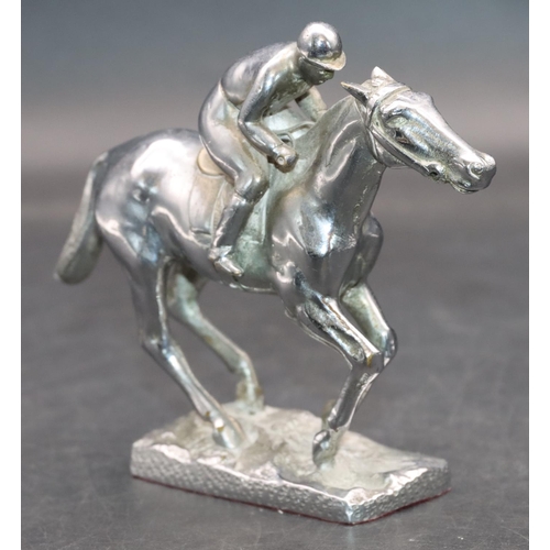 733 - A chrome car mascot in the form of a jockey on horseback, 11cm high, 13.5cm long