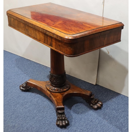 756 - A 19th Century rosewood card table with hinged swivel top and circular green baize interior, on gun ... 