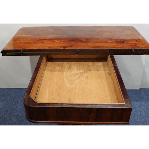 756 - A 19th Century rosewood card table with hinged swivel top and circular green baize interior, on gun ... 