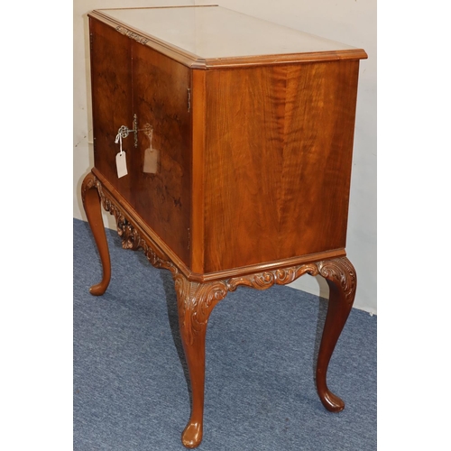 759 - A reproduction burr walnut cocktail cabinet with glass top, 2 panel doors on cabriole legs, 95cm wid... 