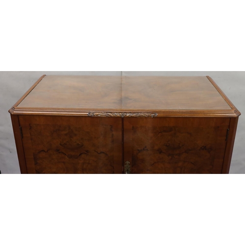 759 - A reproduction burr walnut cocktail cabinet with glass top, 2 panel doors on cabriole legs, 95cm wid... 