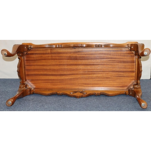 761 - A good quality reproduction walnut Long John coffee table with glass inset top, carved rim on cabrio... 