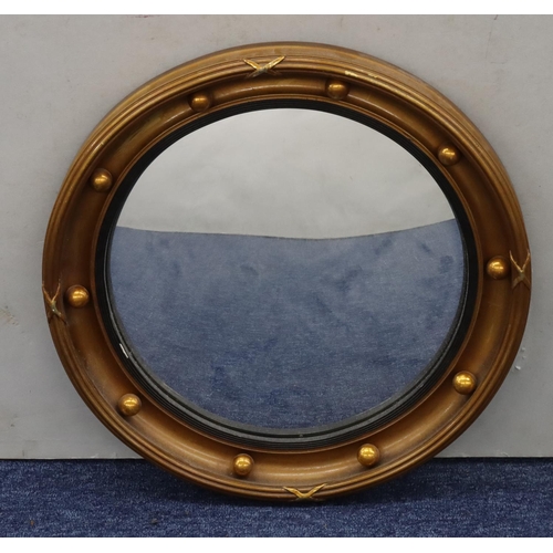 765 - A 20th Century gilt hanging convex wall mirror with inner ball rim, 39cm diameter