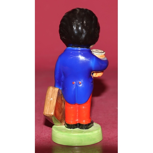 81 - A Coalport advertising figure 