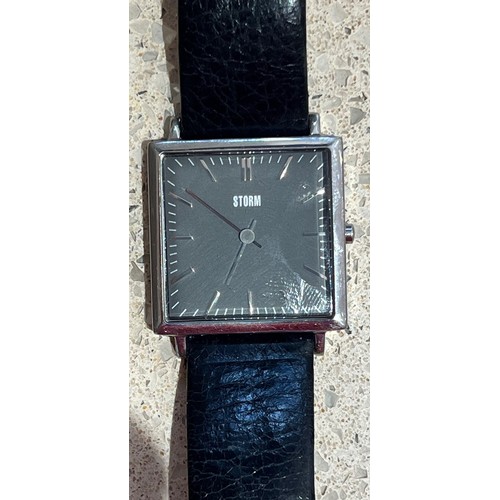 4273 - A Gents Storm slim line square stainless wristwatch with leather strap (needs new battery)