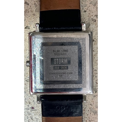 4273 - A Gents Storm slim line square stainless wristwatch with leather strap (needs new battery)