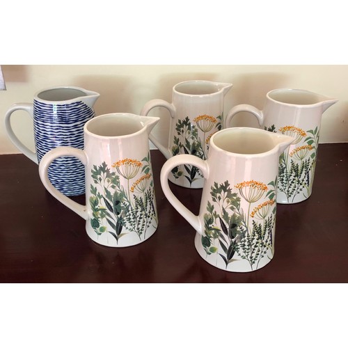 4281 - 4 matching Gisela Graham jugs  with floral pattern, 19cm high and another blue and white jug, 19cm h... 