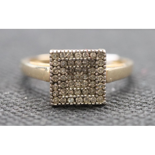 588 - A 9ct gold ladies' square cluster ring set with various diamond chips, size P/Q, 2.2 grams gross