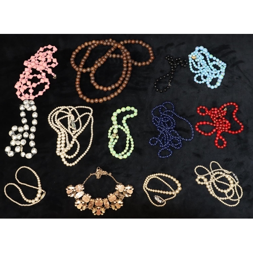 590 - A small quantity of various costume bead necklaces and a quantity of various costume earrings