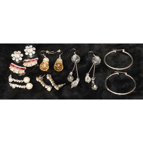 590 - A small quantity of various costume bead necklaces and a quantity of various costume earrings