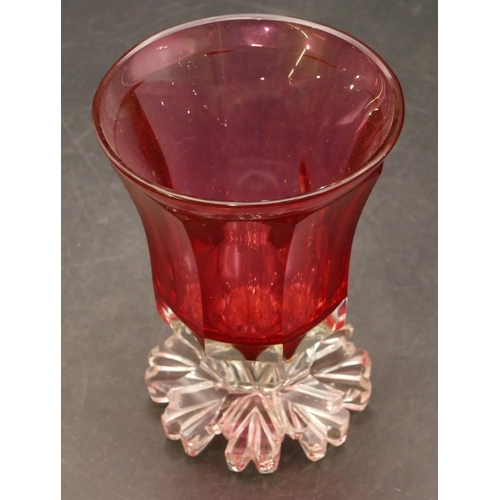 7209 - A 19th Century clear and ruby cut glass trumpet shaped glass with chamfer decoration, 12cm high