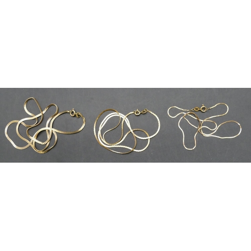 592 - 2 9ct gold flat linked chains, a similar 14ct gold flat linked chain, 8.3 grams gross