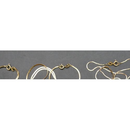 592 - 2 9ct gold flat linked chains, a similar 14ct gold flat linked chain, 8.3 grams gross