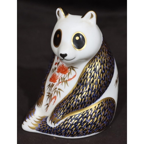 108 - A Royal Crown Derby paperweight in the form of a seated panda bear, with silvered coloured stopper, ... 