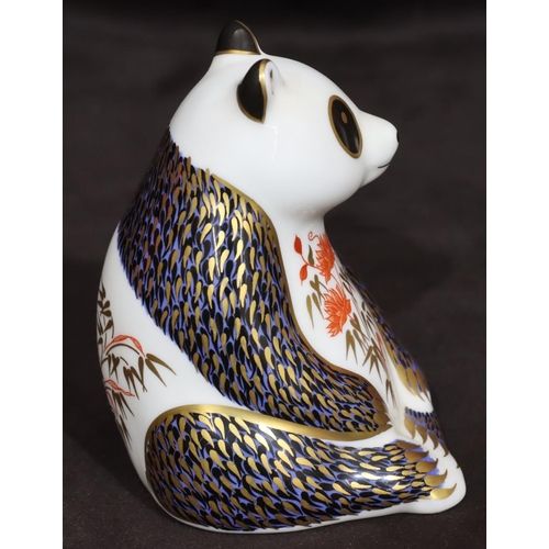 108 - A Royal Crown Derby paperweight in the form of a seated panda bear, with silvered coloured stopper, ... 