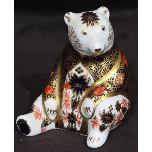 112 - A Royal Crown Derby Imari patterned paperweight in the form of a seated bear, with silver coloured s... 