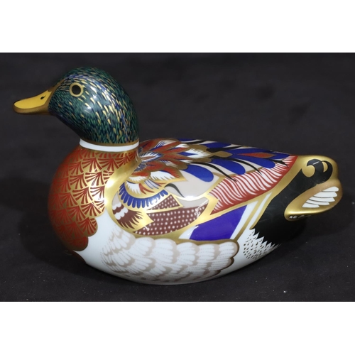 114 - A Royal Crown Derby Imari patterned paperweight in the form of a duck, with silver coloured stopper,... 