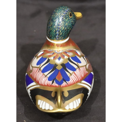 114 - A Royal Crown Derby Imari patterned paperweight in the form of a duck, with silver coloured stopper,... 