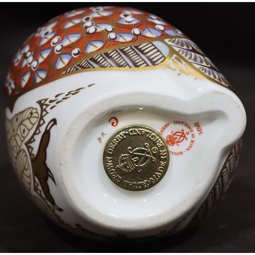 118 - A Royal Crown Derby Imari pattern paperweight in the form of an owl, with gold coloured stopper, 11.... 