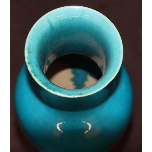 135 - A 19th Century Oriental round bulbous thin necked trumpet shaped vase on turquoise ground, 24.5cm hi... 