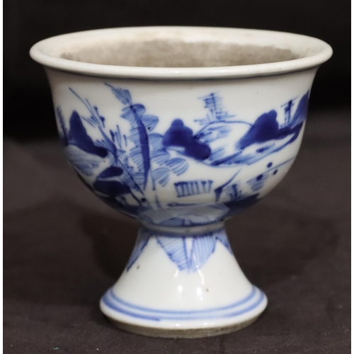 140 - A 19th Century Chinese small round bulbous trumpet shaped cup on blue and white ground depicting lan... 