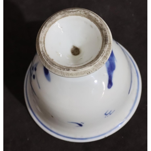 140 - A 19th Century Chinese small round bulbous trumpet shaped cup on blue and white ground depicting lan... 