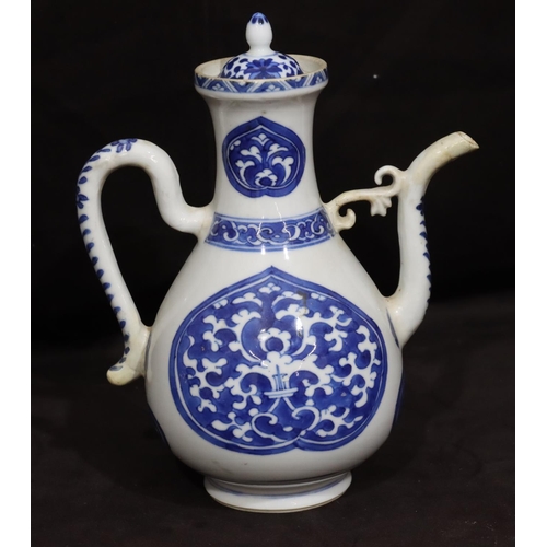 141 - An Oriental round bulbous shaped teapot on blue and white ground with scroll decoration, with cover,... 