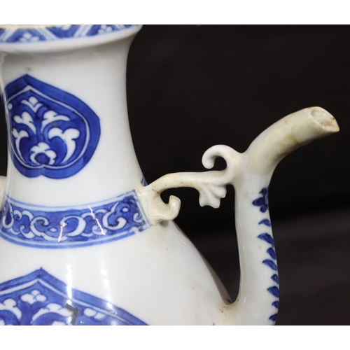 141 - An Oriental round bulbous shaped teapot on blue and white ground with scroll decoration, with cover,... 